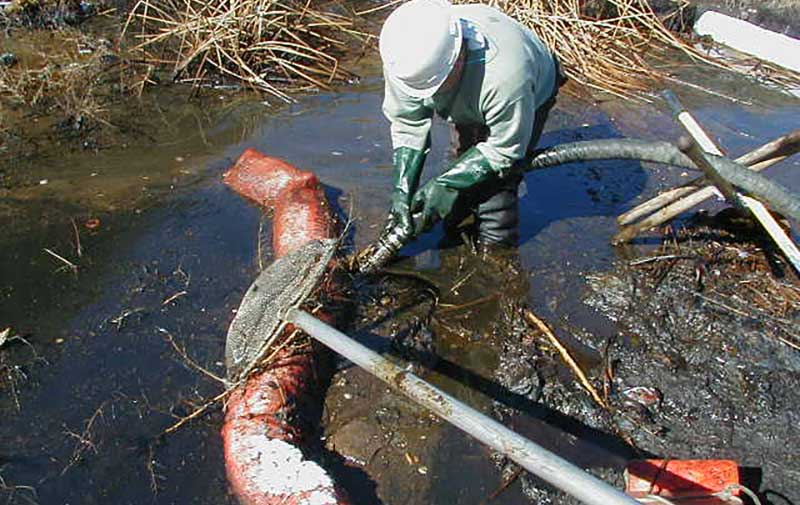 BELFOR Environmental performs oil spill removal from stream