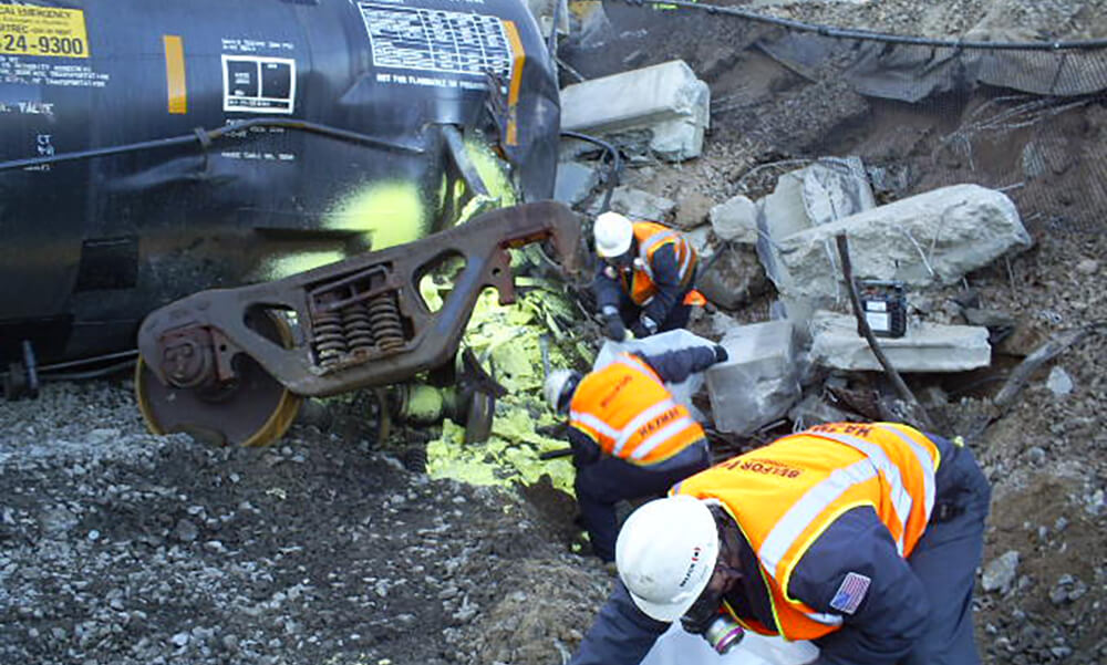 BELFOR Environmental cleans hazardous sulfur after railroad derailment